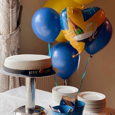 Student tårta och ballonger.